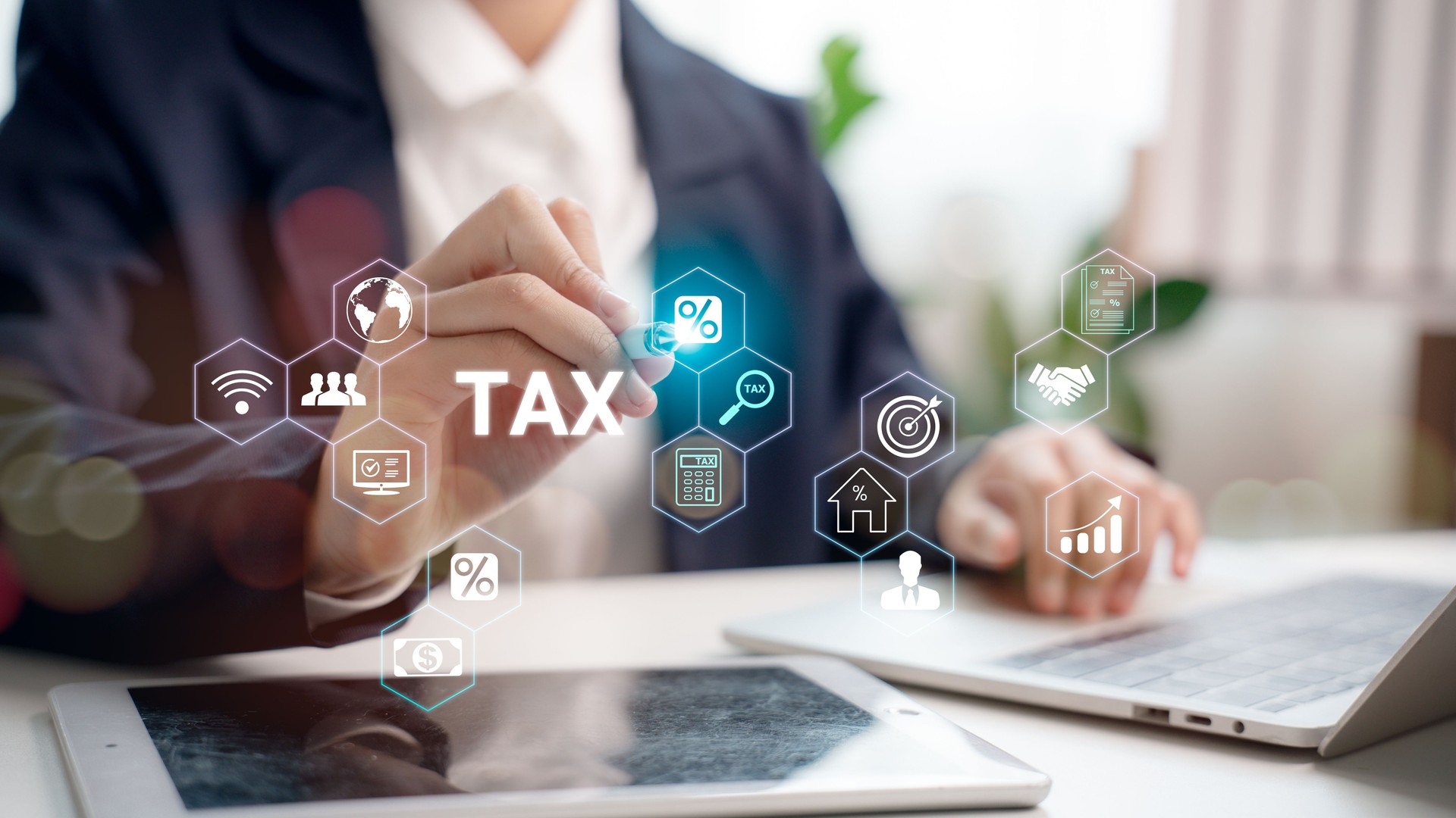 Businessperson using digital pen on tax technology interface. Concept of smart tax planning, financial software, digital accounting, percentage calculation, and fintech transformation system.